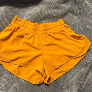 Women's orange Lululemon shorts